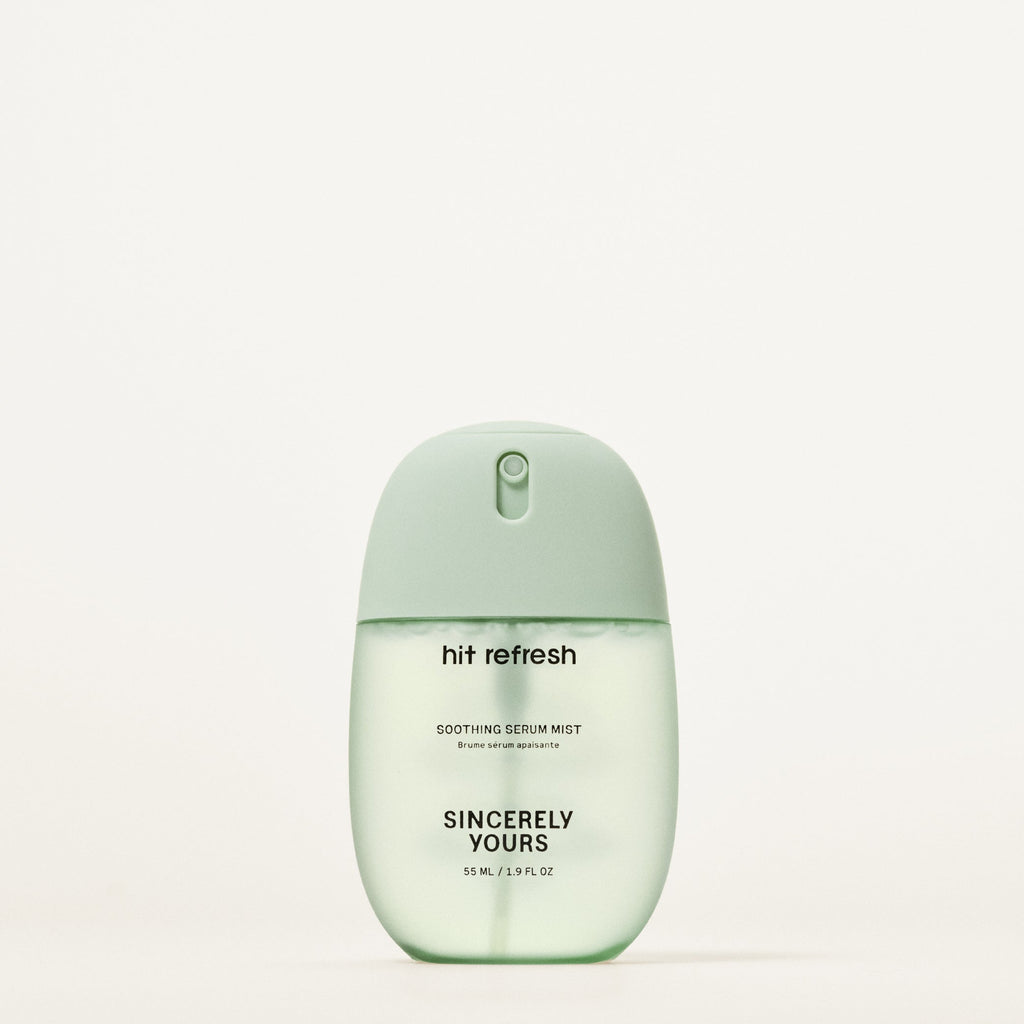 Soothing serum mist bottle labeled 'hit refresh' by 'Sincerely Yours' on a light background