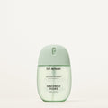 Soothing serum mist bottle labeled 'hit refresh' by 'Sincerely Yours' on a light background